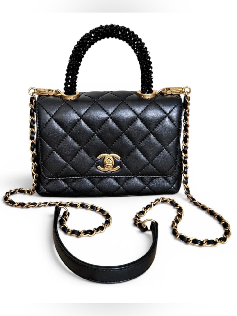 CHANEL Mini Flap Black Quilted Lambskin with Beaded-Handle Shoulder Bag.